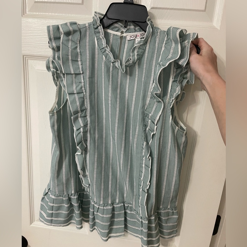 Green and white ruffle top with lace detailing